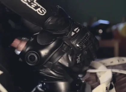 Rubber boy sucking biker master cock